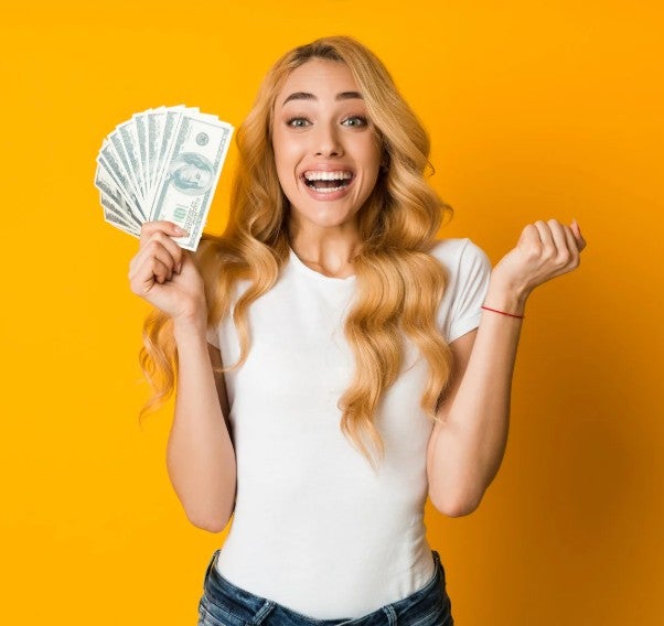 women holding money