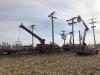linemen work in bucket trucks